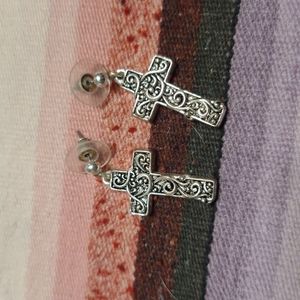 Dangling silver scroll cross earrings